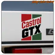 CASTROL GTX adhesive applied to the rear of a white vehicle