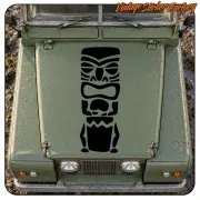 Black TIKI sticker applied to the front of a green vehicle