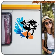 Cartoon character sticker applied to the side of a caravan, next to a female traveller