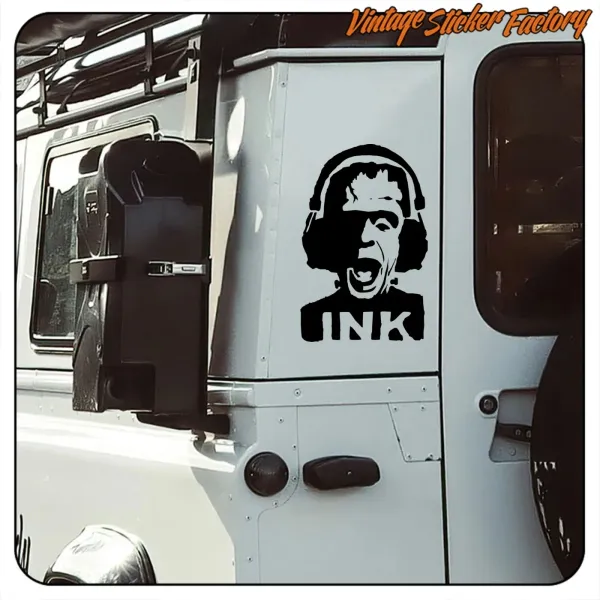 Pegatina de Herman Munster con auriculares y texto INK en el lateral de una furgoneta