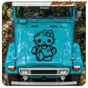 Pegatina KITTY ZOMBIE negra aplicada sobre el frontal de un vehículo azul