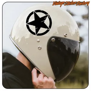 Circular black star applied to a light-coloured motorbike helmet