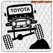Pegatina negra Toyota con todoterreno trepando por una roca